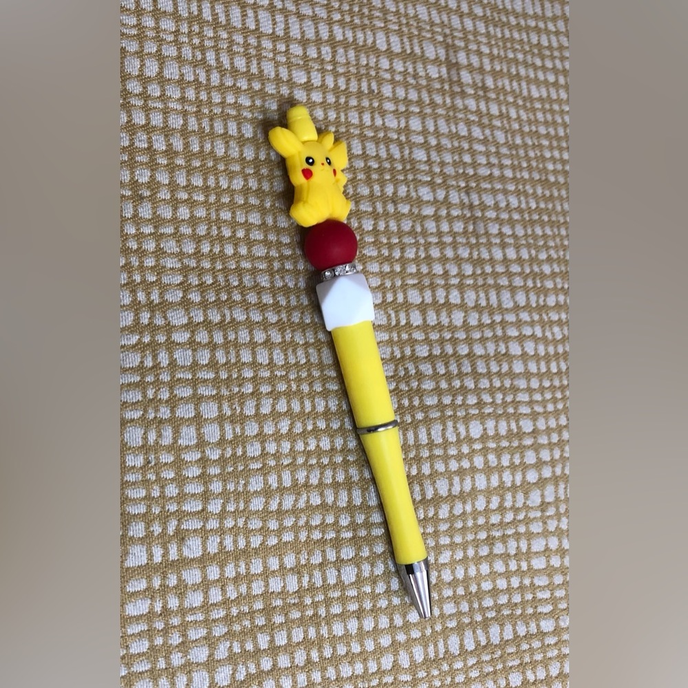 Pokémon pikashu beads pen yelllow . 6”LX 1” W